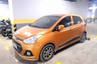 Cần bán Hyundai Grand i10 1.2AT bản đủ, đời 2015, màu cam, nhập khẩu